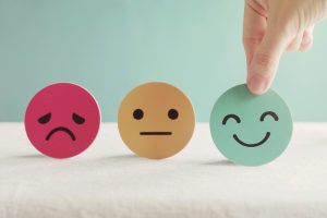 Paper emojis depicting moods.