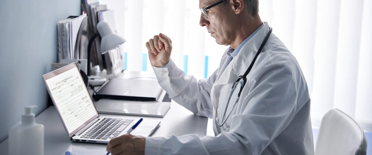 doctor working at computer