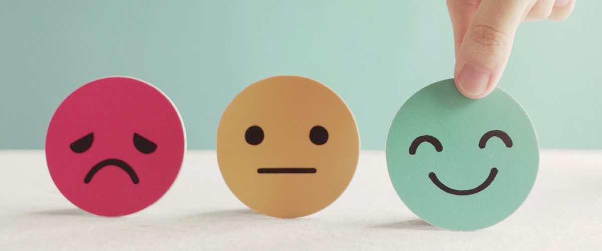 Paper emojis depicting moods.